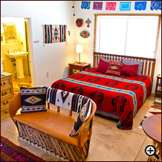 The Fiesta Room bed at Cat Mountain Lodge